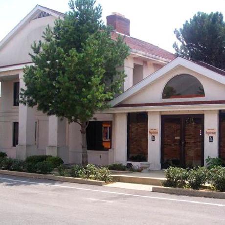 Magnuson Hotel and Suites Bell